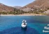 Απίθανη πανοραμική θέα από την Τήλο με γαλάζια νερά και παραδοσιακή νησιωτική ατμόσφαιρα. Ιδανικό για ήρεμες διακοπές.