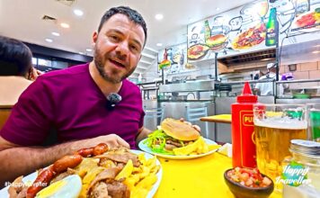 Δοκιμάζουμε chacarero και pique macho στο Σαντιάγο (ΒΙΝΤΕΟ) #happytraveller Ο Ευτύχης μέσα σε εστιατόριο στο Σαντιάγο της Χιλής δοκιμάζει το παραδοσιακό σάντουιτς Chacarero και το πιάτο pique macho με πατάτες, κρέας, αυγό και λουκάνικα.